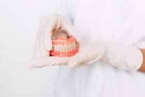how to clean dentures